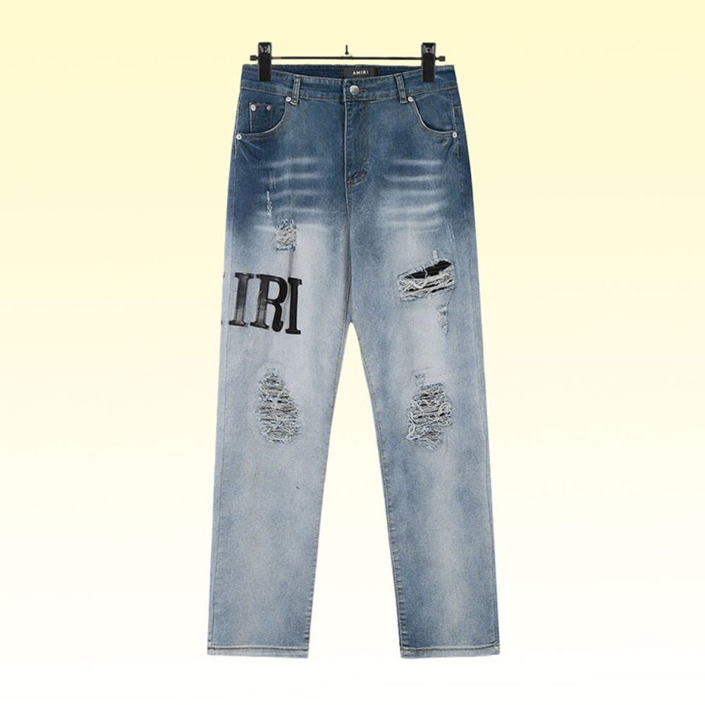 Amiri Blue Ripped Black Patch Print Jeans